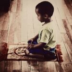 a boy praying