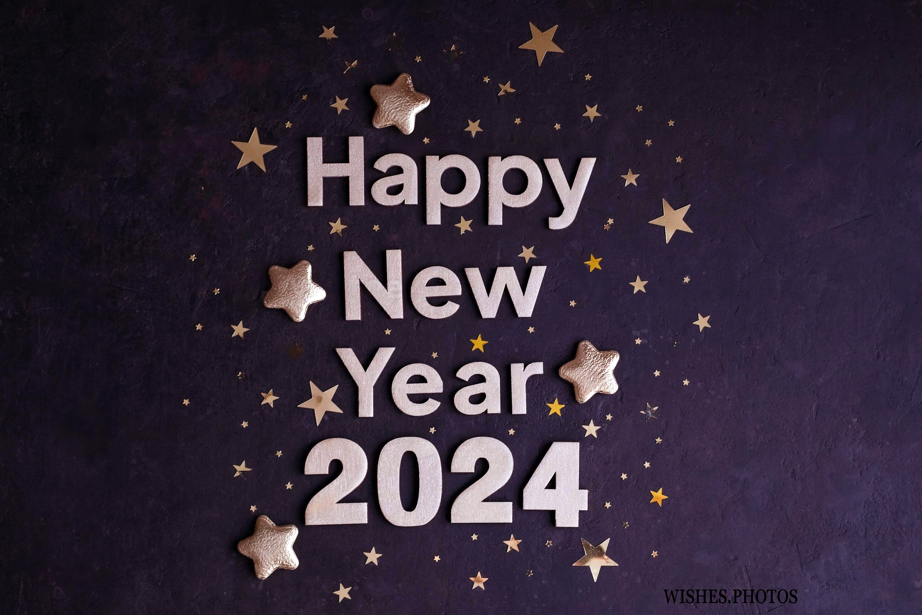 happy new year 2024 golden numbers 2024 with gold stars on a dark background new year greeting card photo