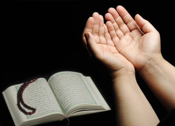 Hands Up Islamic Praying Koran