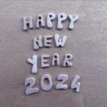 happy new year 2024 with wooden letters and numbers