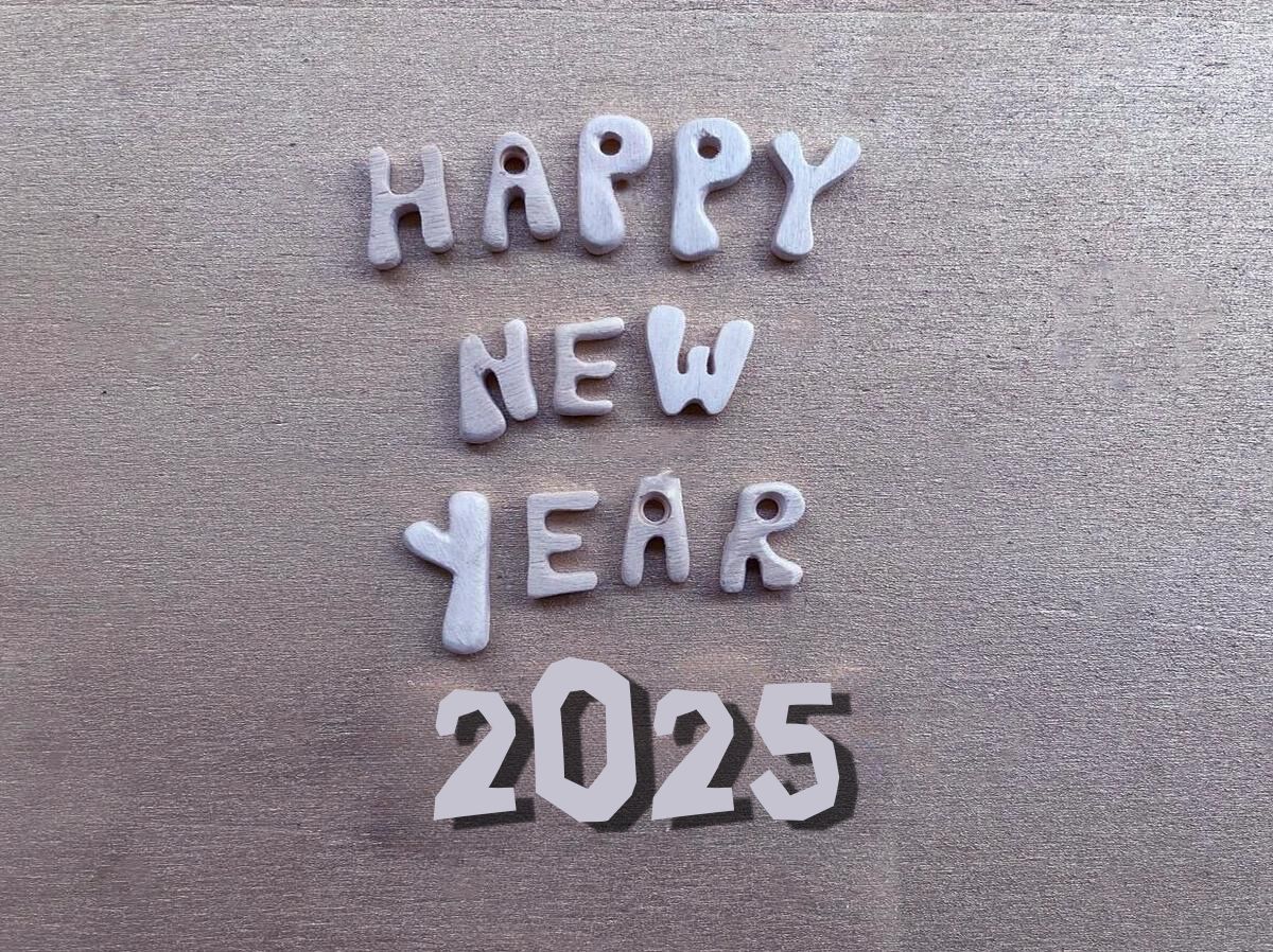 happy new year 2025 with wooden letters and numbers