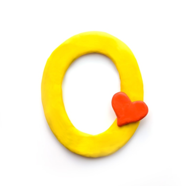 yellow plasticine letter o english alphabet with red heart meaning love 131240 1705