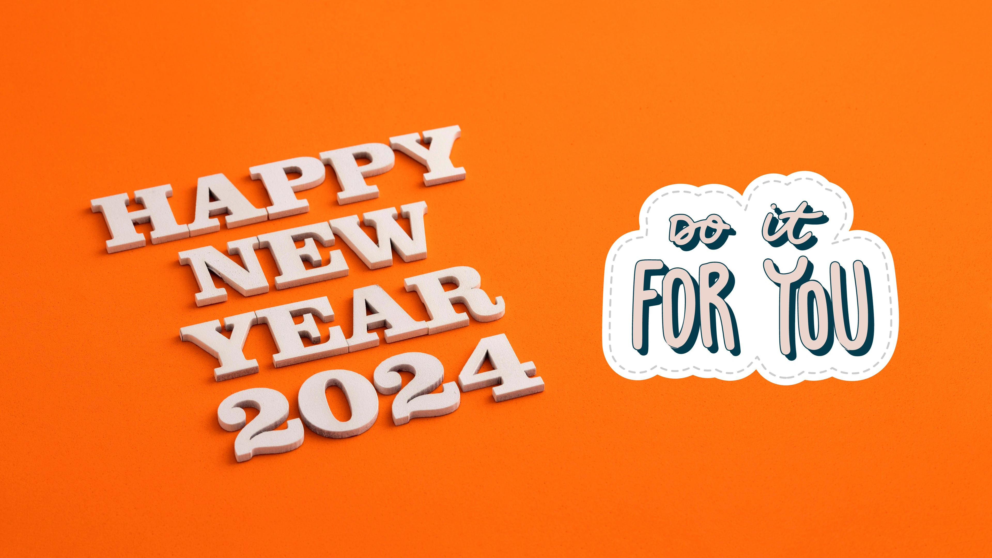Orange background and wooden text Happy New Year 2024 4K UHD Wallpaper with do it for you wish.