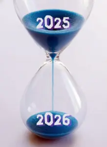 passing new year present 2025 future 2026 concept part hourglass falling sand taking shape years