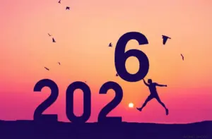 hd new year background 2026 with a man placing 2026 letter by flying jump
