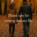 A cozy couple walking through autumn leaves — Thank you for coming into my life.